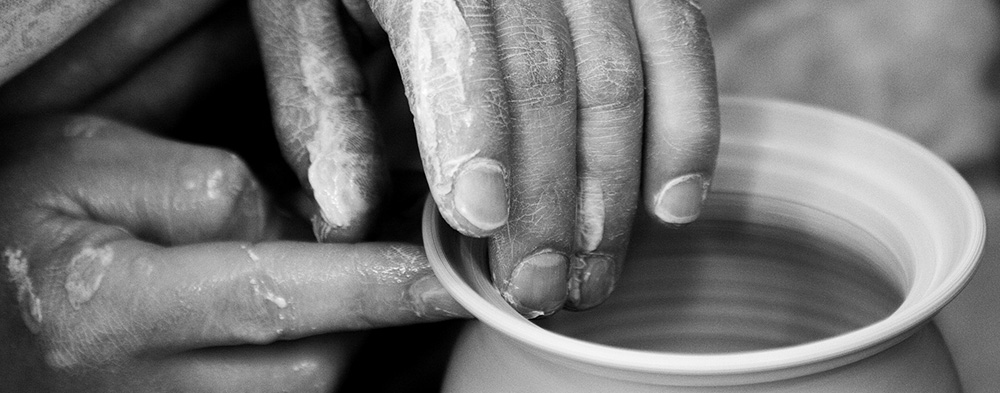 Potter working with clay