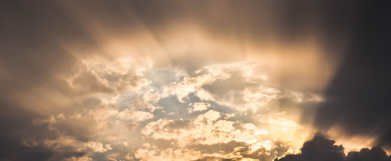 Sky with clouds and sun